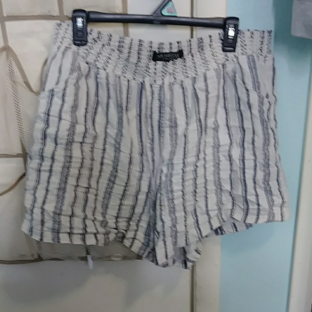 White and blue/grey shorts